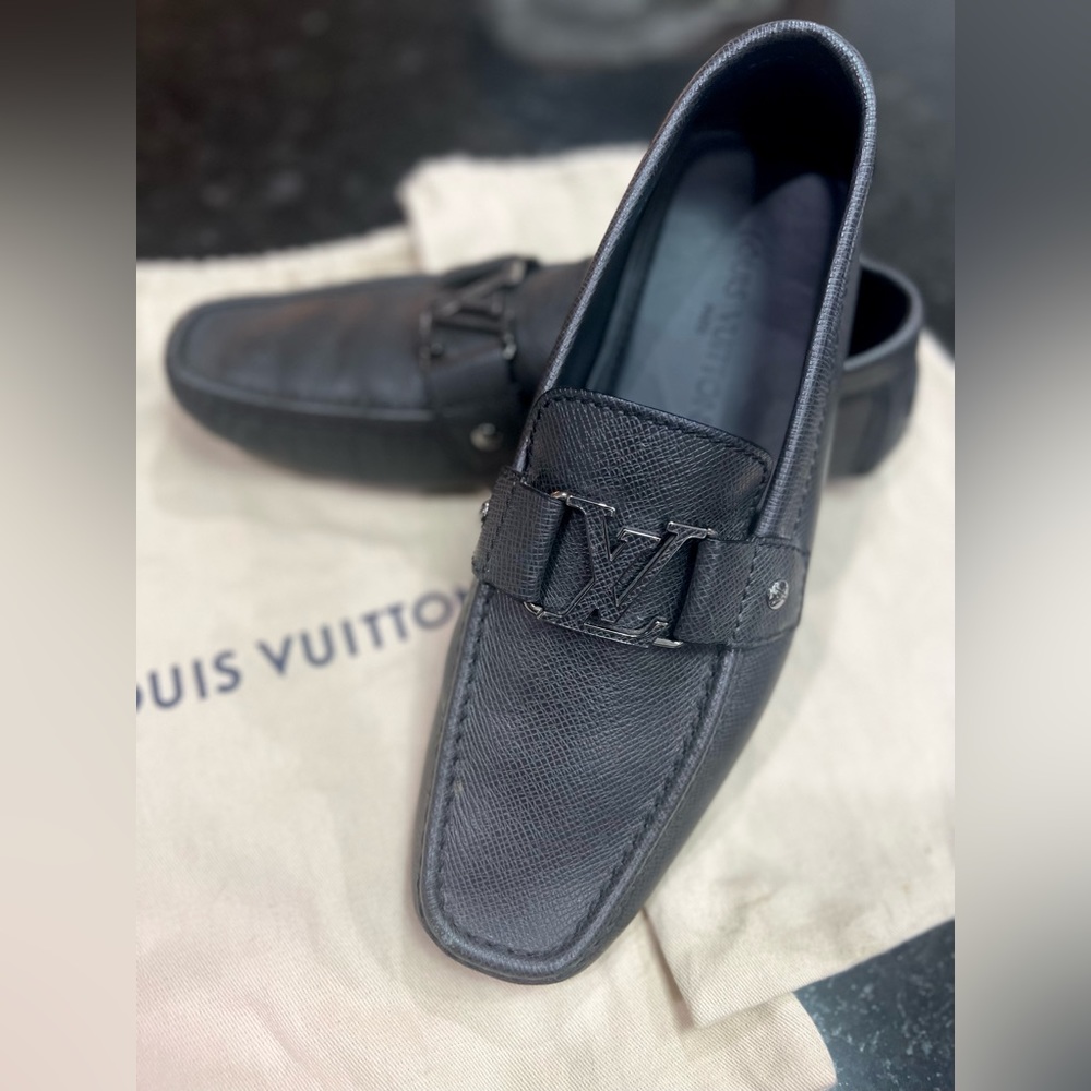 Louis Vuitton loafers.